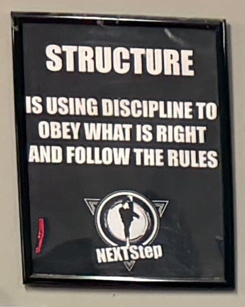 The Structure poster on the NEXTStep dojang wall