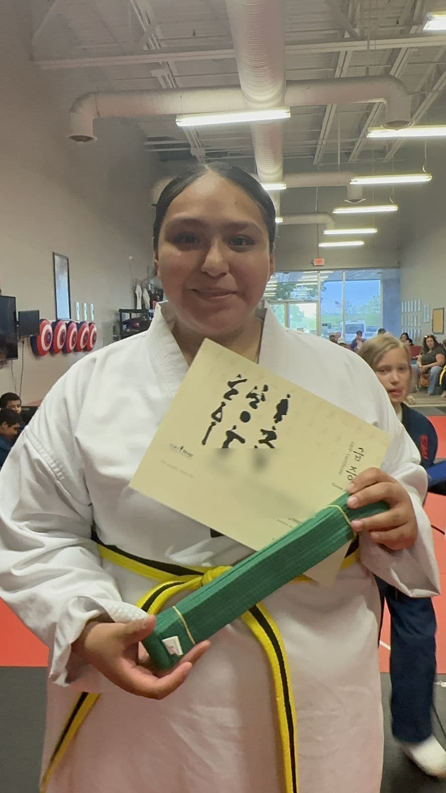 Student celebrating a new belt at NEXTStep in Gettysburg