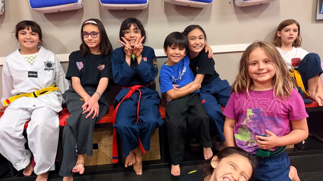Happy kids together after Taekwondo class at NEXTStep